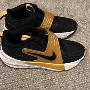 Nike Kid’s Black and Gold Athletic Slip-On Basketball Sneakers